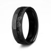 Imperishable men's tungsten band in a hammered and brushed finish cradles a glittering band of meteorite.