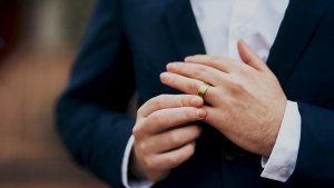 Man with Expensive and Cheap Men‘s Wedding Bands