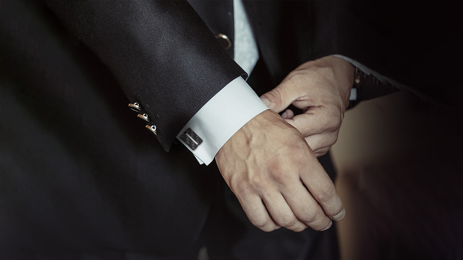 Cufflinks remain a staple of formal wear, anchoring the look with a touch of personality.